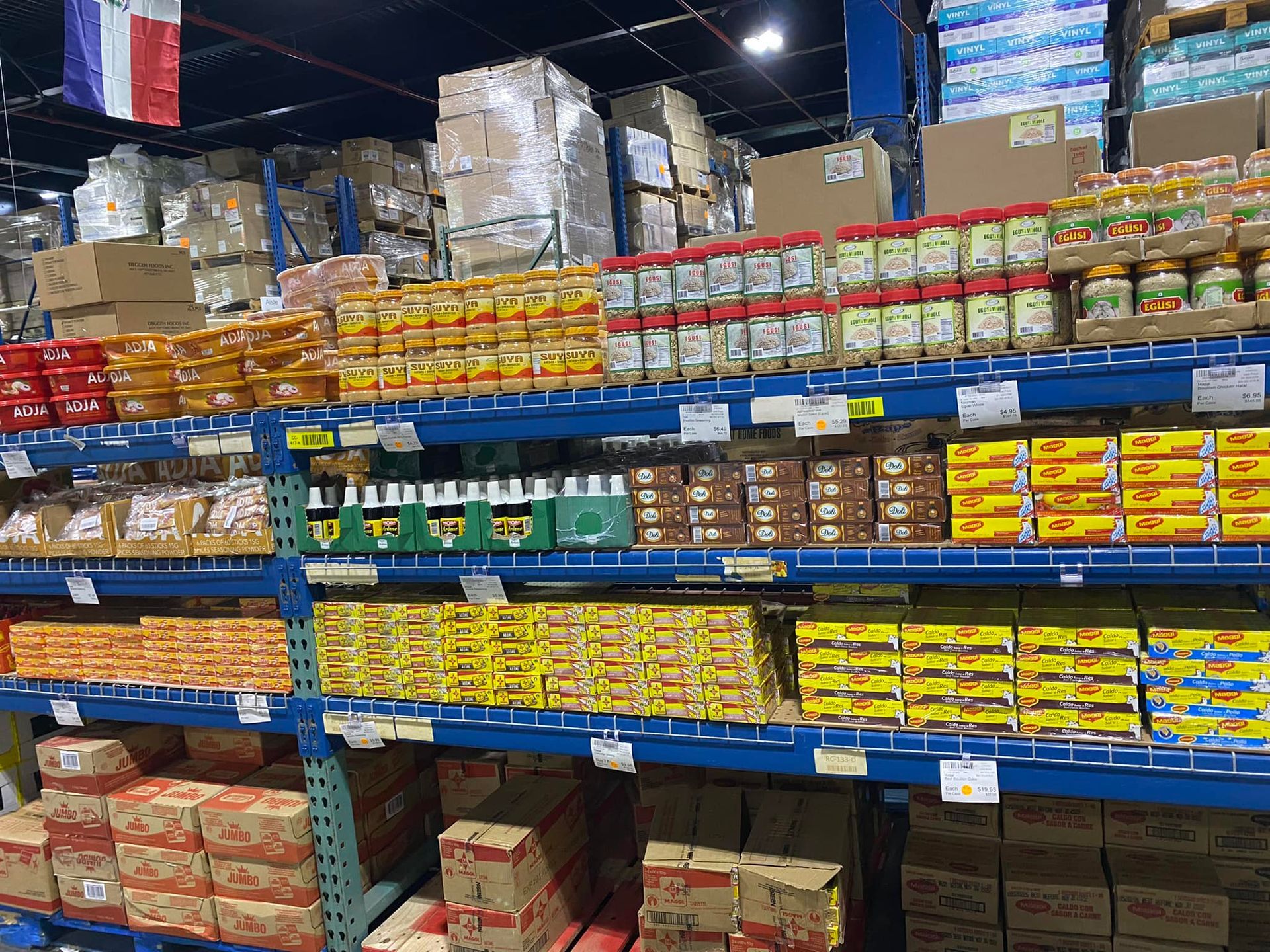 A warehouse filled with lots of food and boxes