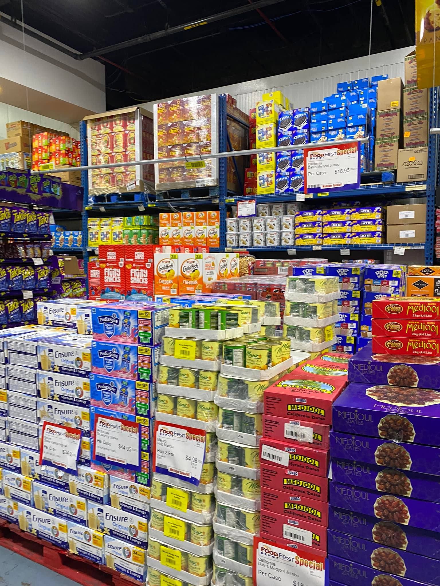 A warehouse filled with lots of boxes of food and drinks.