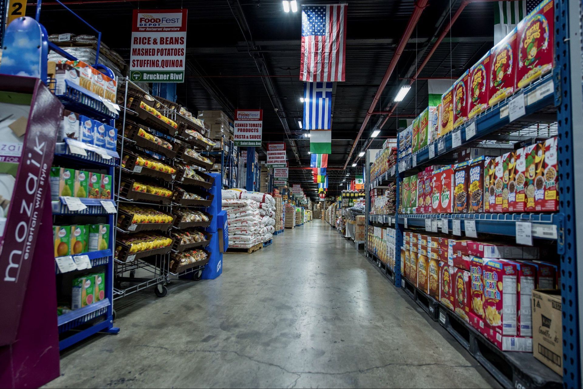 An aisle in a grocery store filled with lots of products