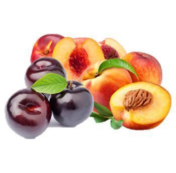 A pile of plums and peaches with leaves on a white background.