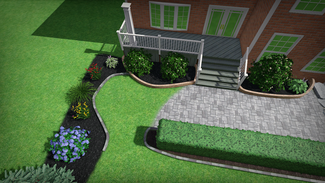 Landscaped front yard with a brick house and a stone patio.