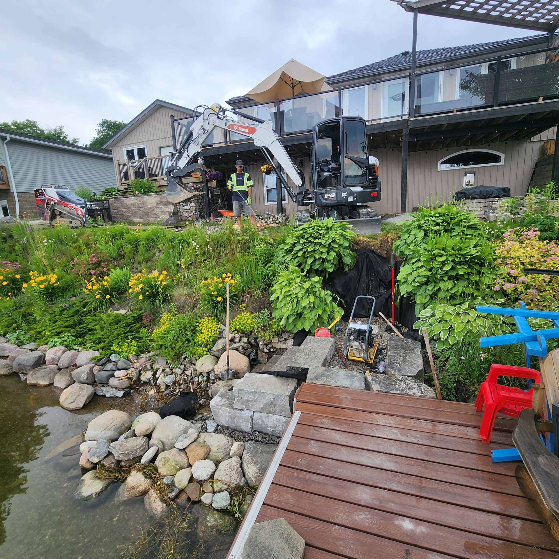 A large house with a crane in front of it
