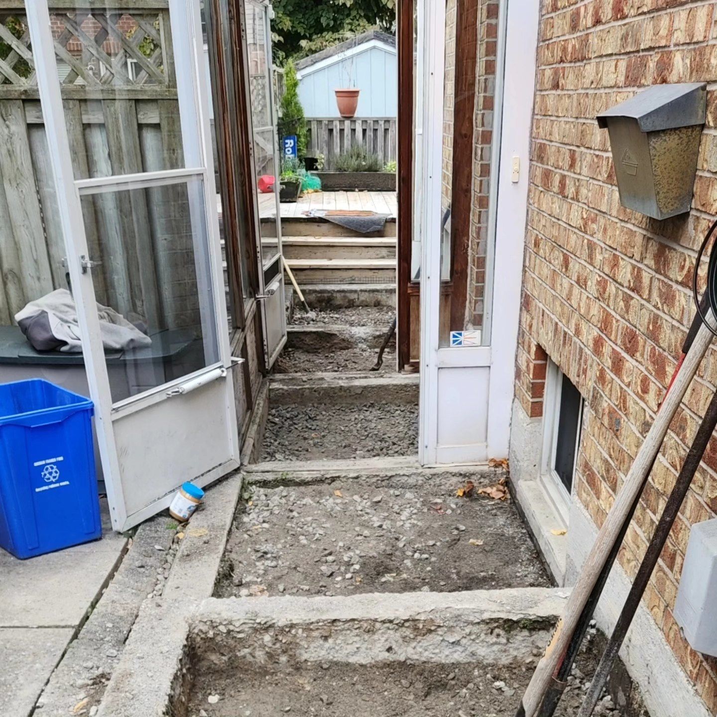 A blue trash can with the number 10 on it