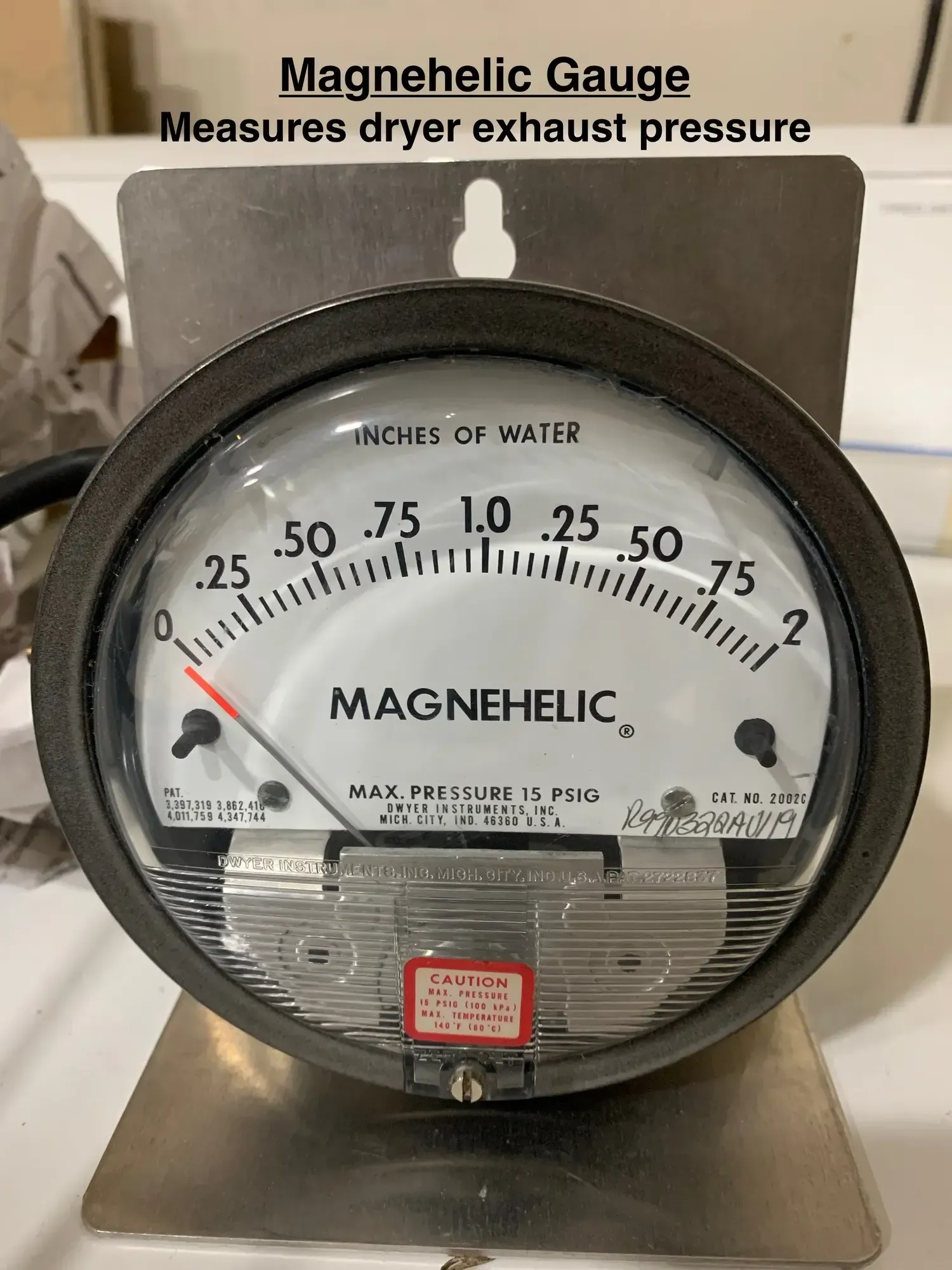 Love's Dryer Vent Cleaning - A magnetic gauge measures dryer exhaust pressure