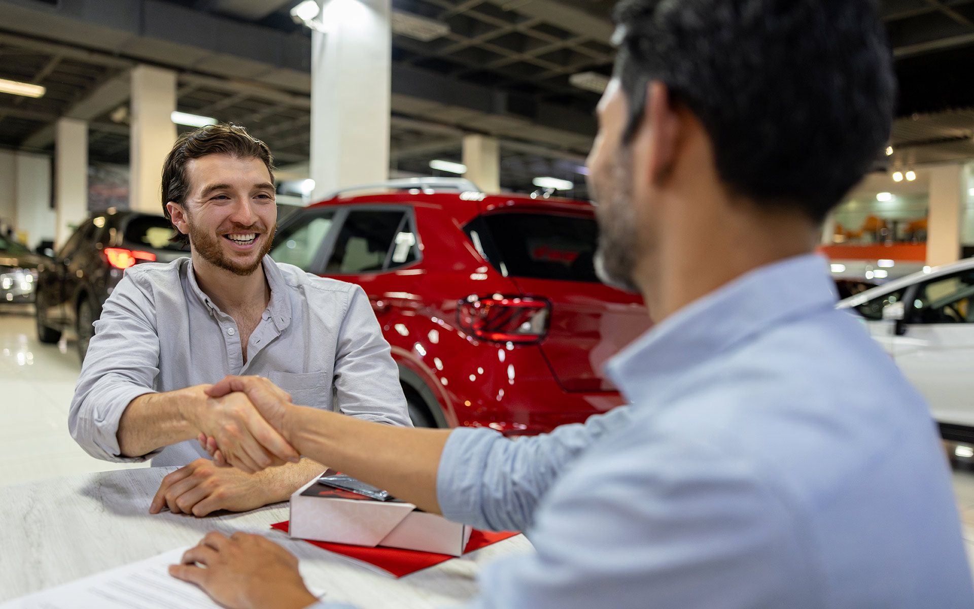 Man And Client Shaking Hands — Augusta, GA — Car Plus LLC