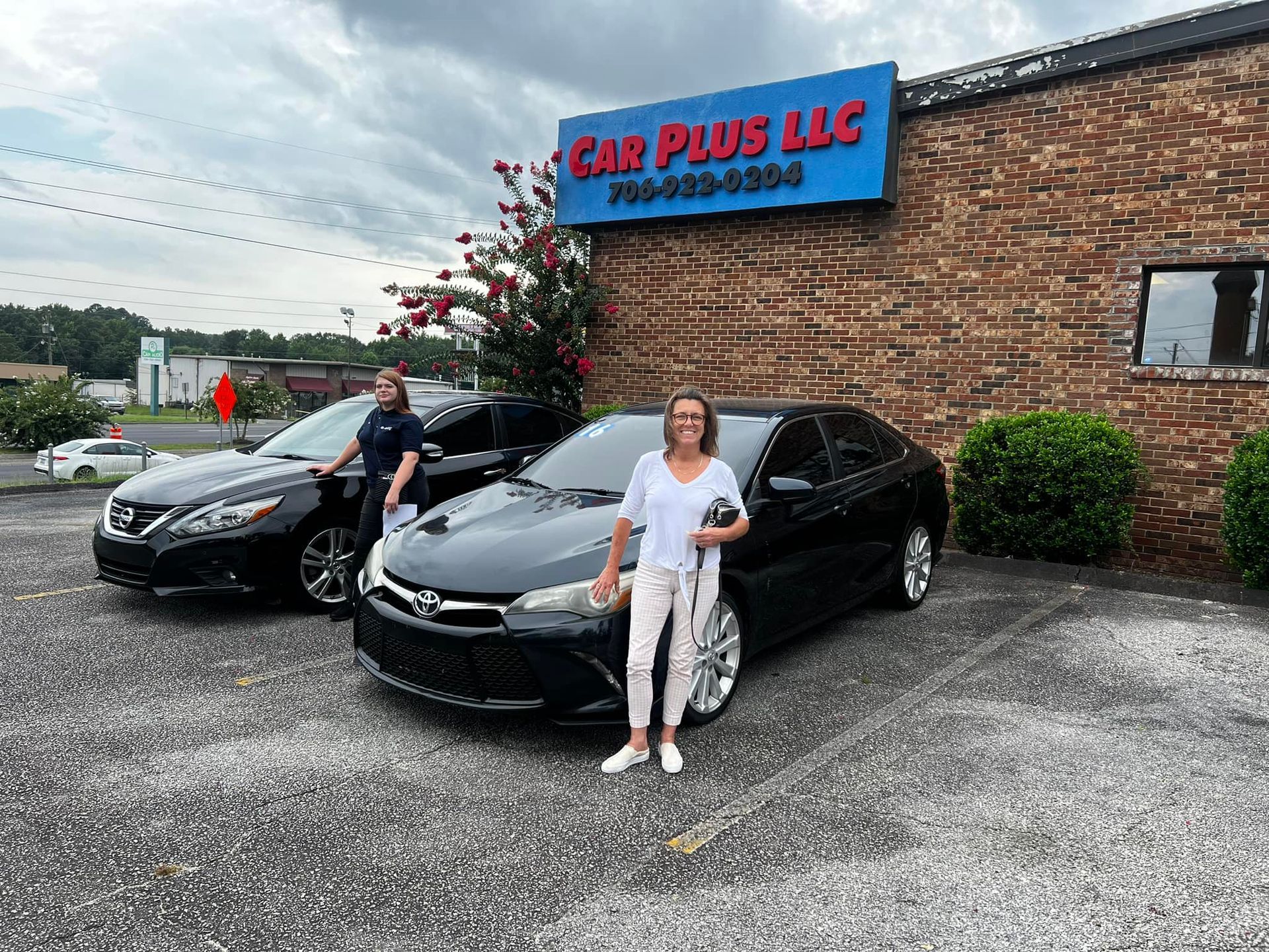 Two Happy Woman With Cars — Augusta, GA — Car Plus LLC