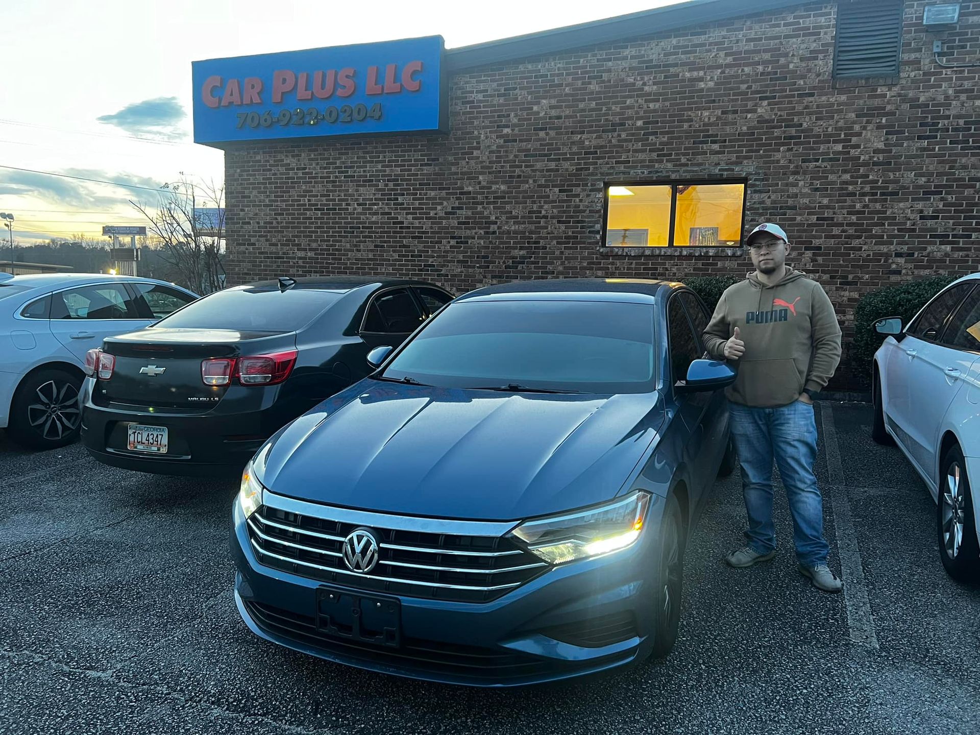 Man With His New Car — Augusta, GA — Car Plus LLC