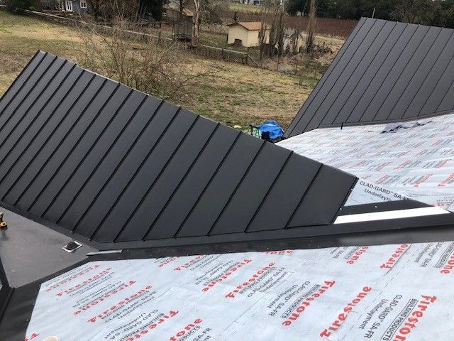 A roof with a firestone roofing material on it