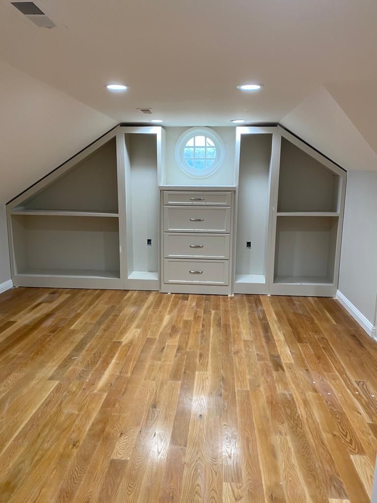 There is a window in the corner of the room.