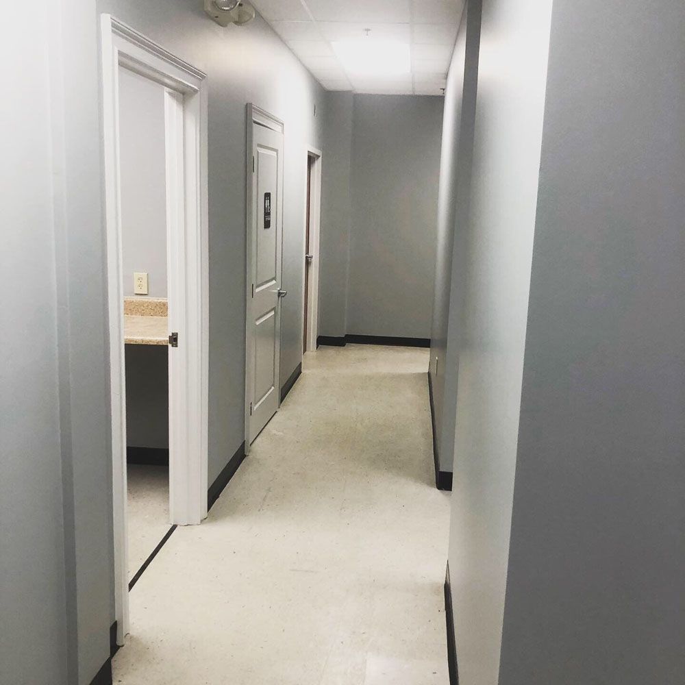 Long Hallway with Gray Walls