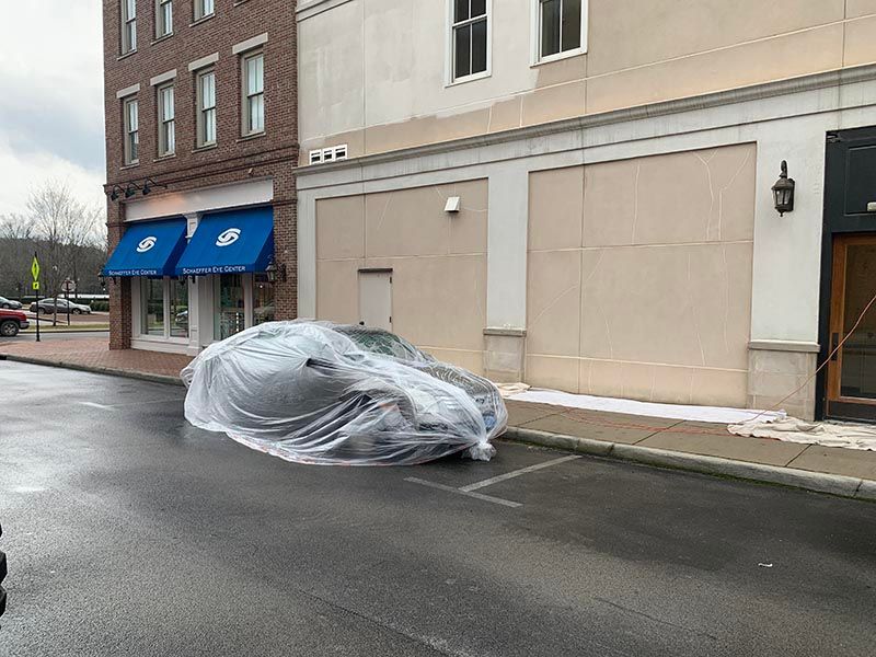 Car is Wrapped in Plastic on the Side