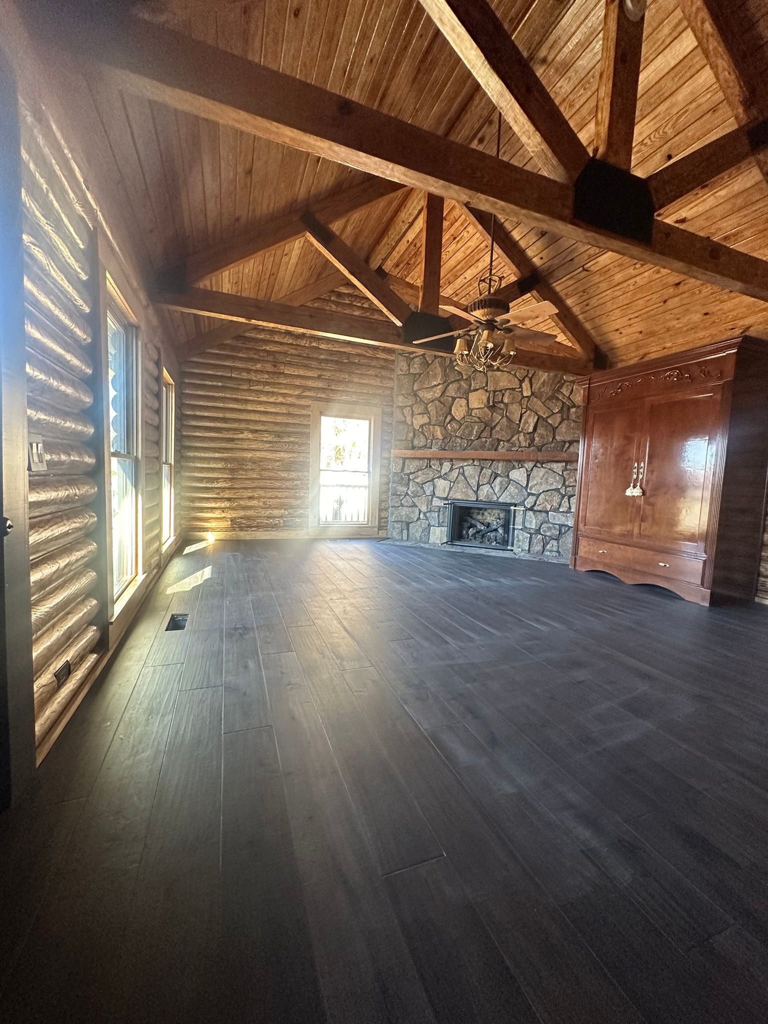 There is a fireplace in the middle of the room.