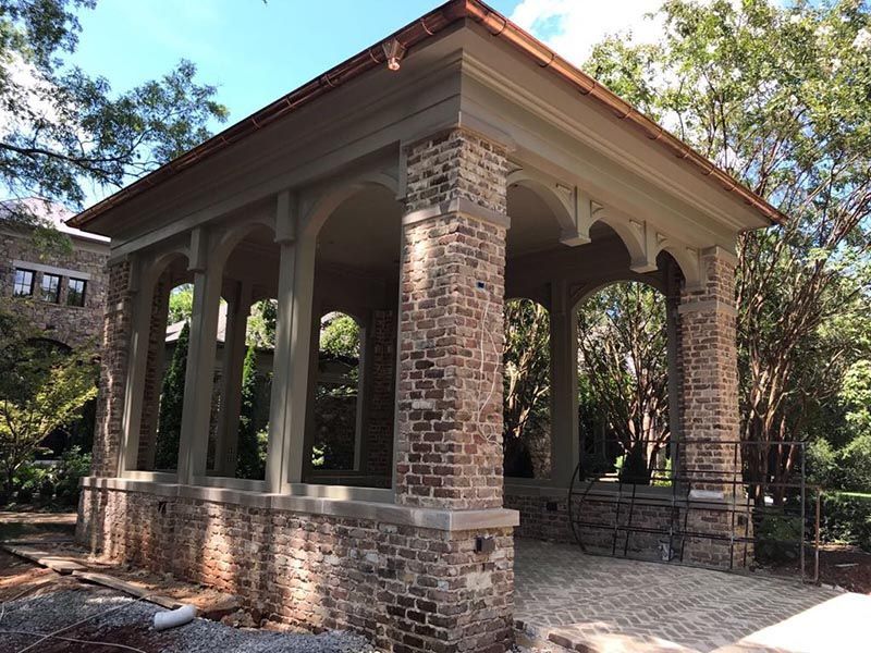 Brick House with Arches and a Copper Roof