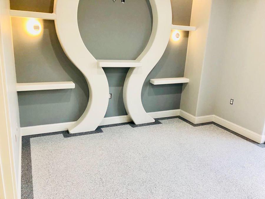 Room with a Gray Wall and White Shelves