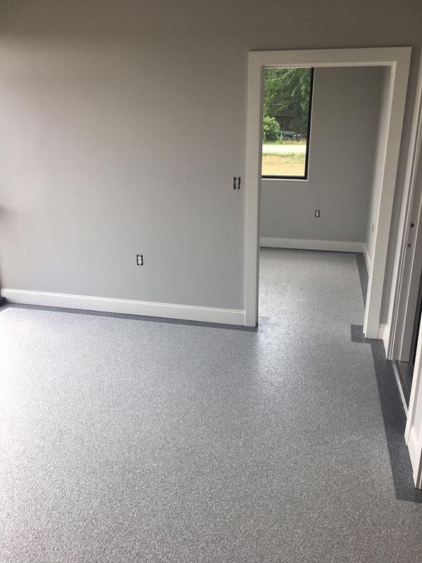 Room with a Gray Floor and a Doorway