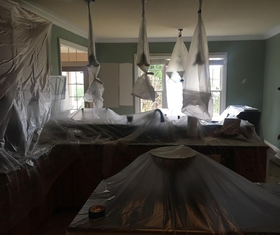 Kiitchen is Being Painted and Covered in Plastic