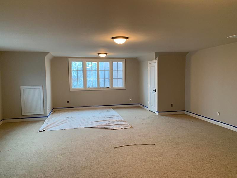 Empty Room with a Carpeted floor