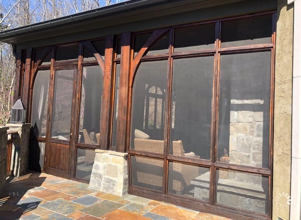 Screened in Porch with a lot of Windows
