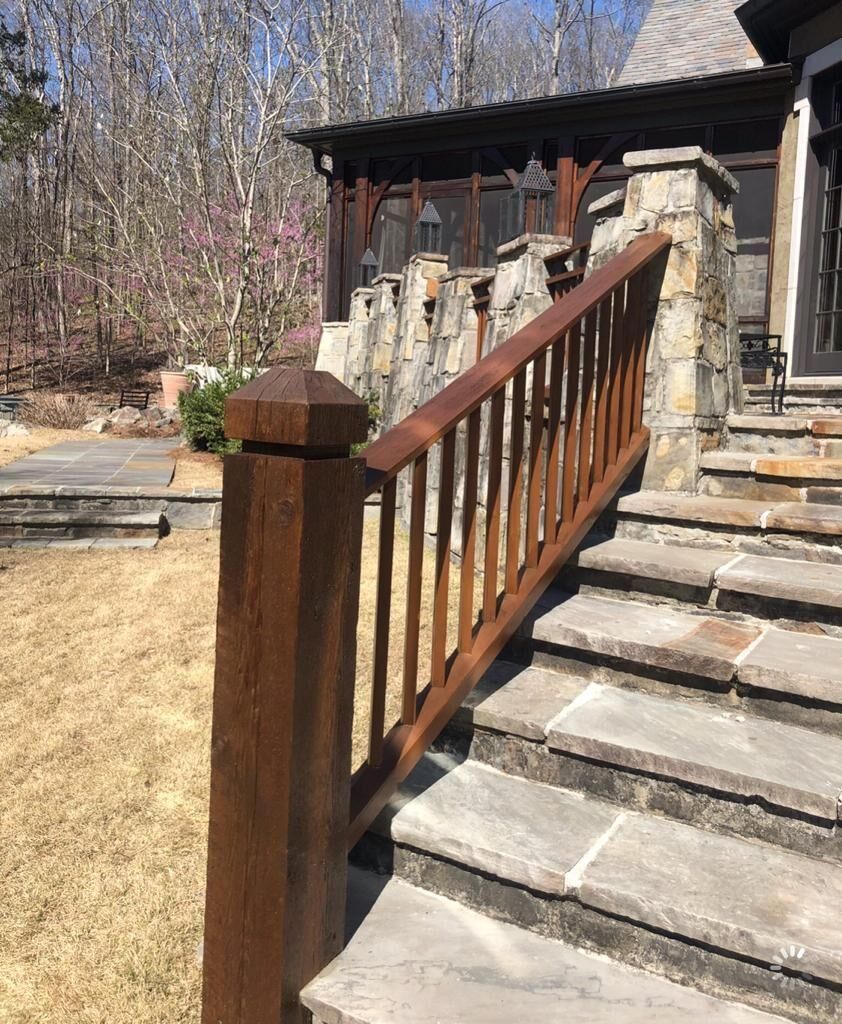 Wooden Railing on a Set of Stairs