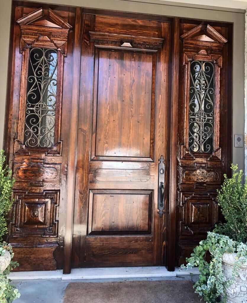 Wooden Door with a Wrought Iron Window