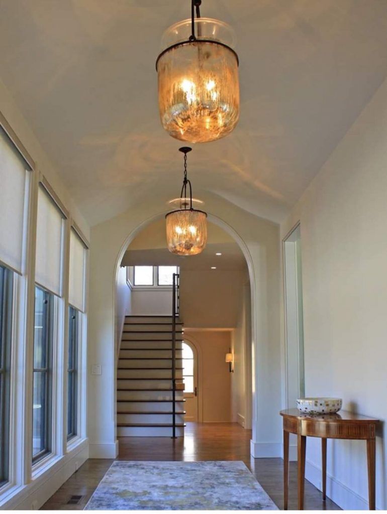 Hallway with a Staircase and Lamps