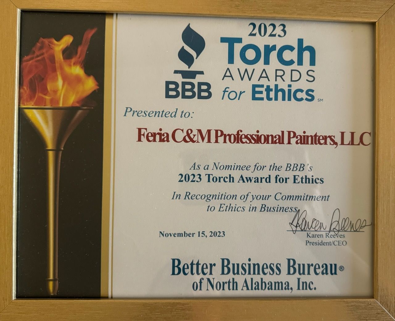 A torch award for ethics is presented to faria c & m professional painters llc