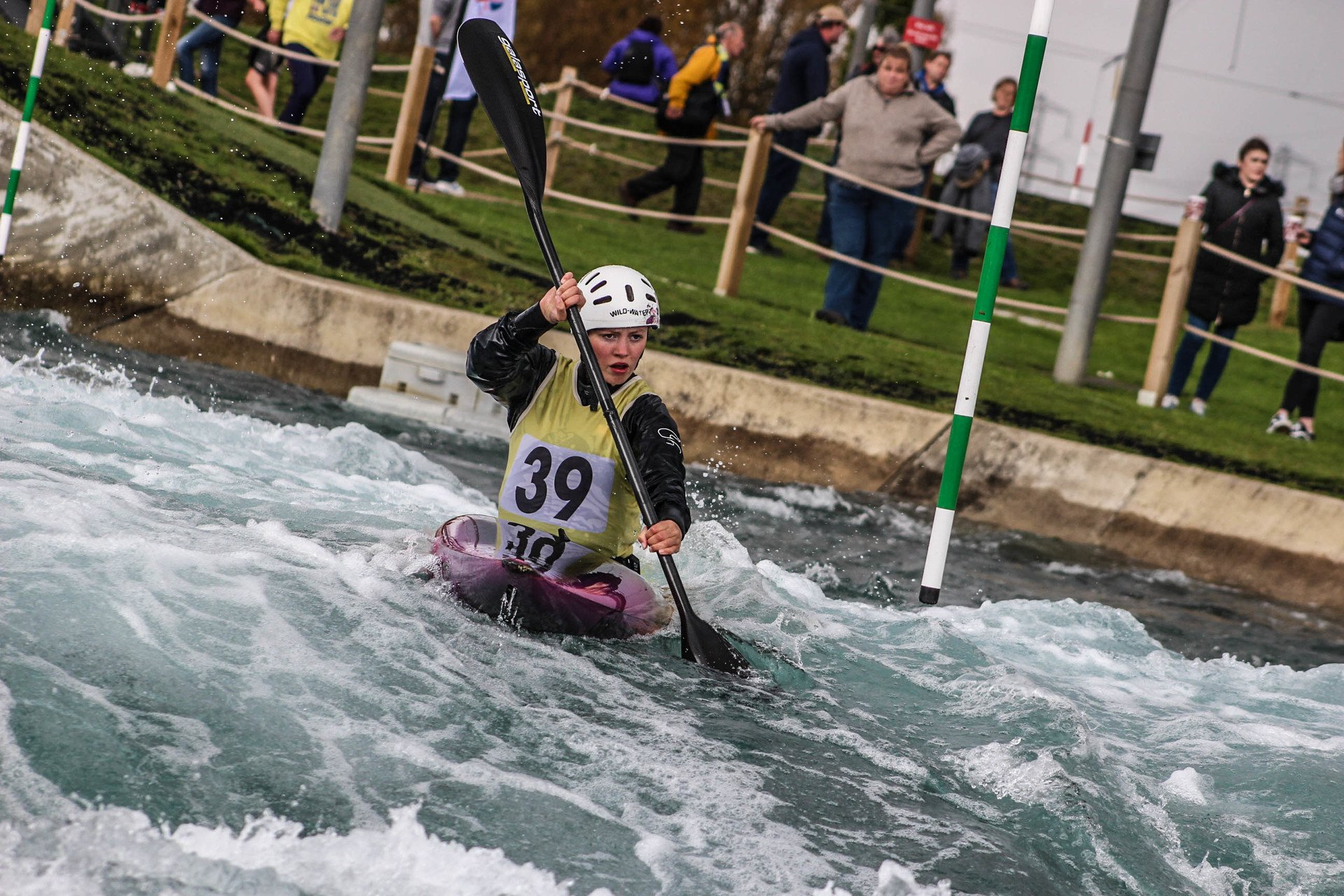 A person in a kayak with the number 39 on it