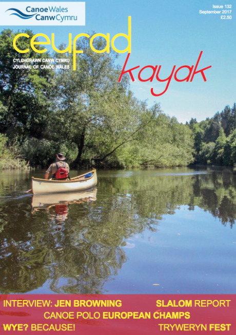 A man in a canoe on the cover of a magazine called ceurad kayak