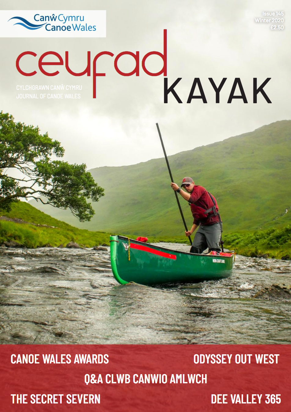 A man in a green canoe is on the cover of ceufad kayak magazine