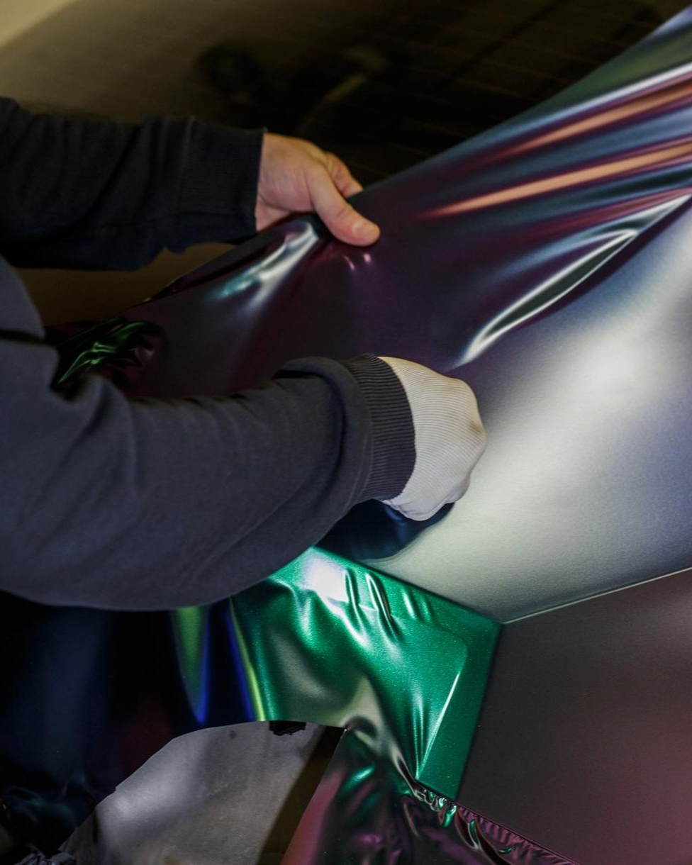 A close up of a car wheel with a mercedes logo on it