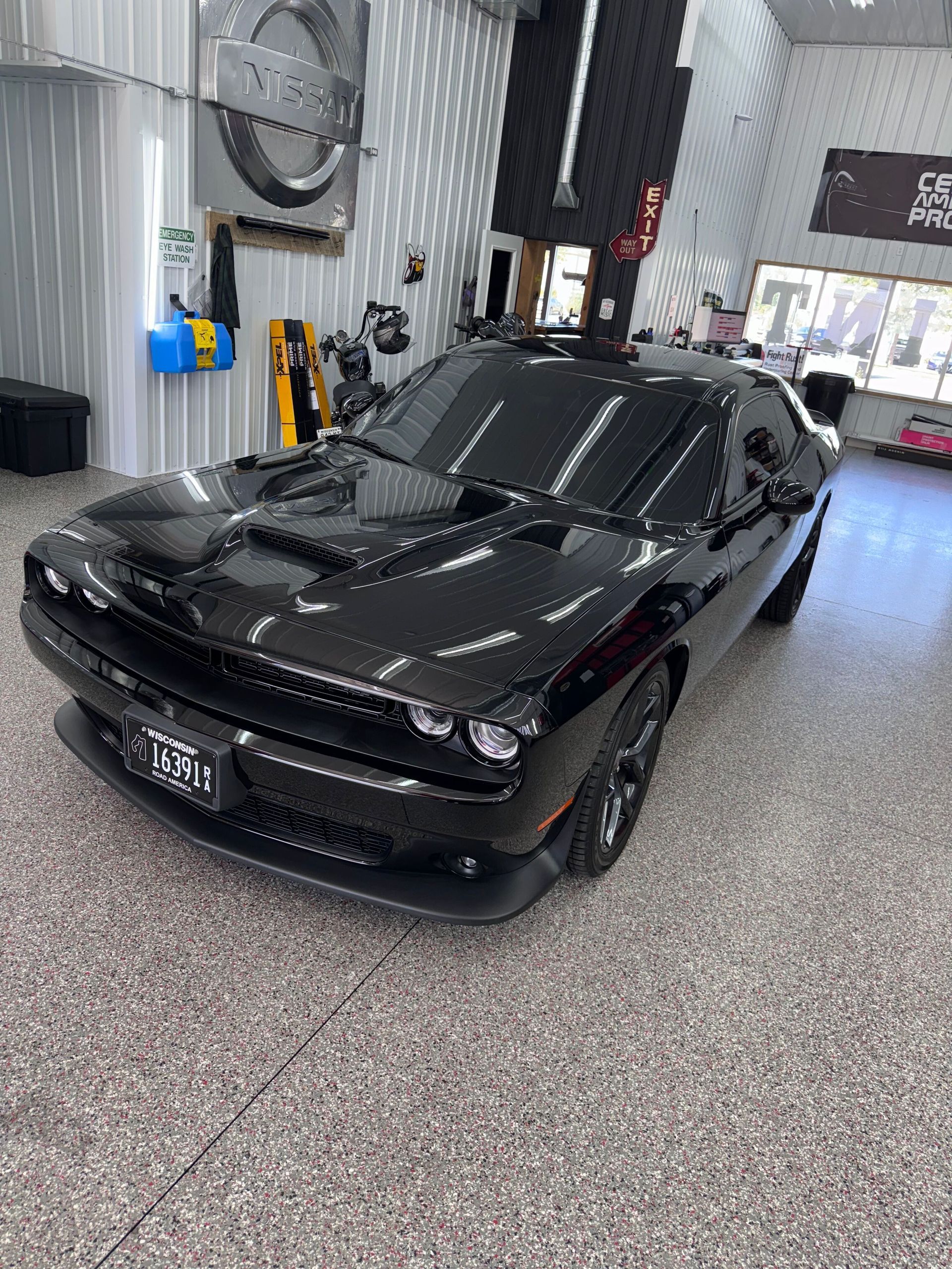A close up of a car wheel with a mercedes logo on it