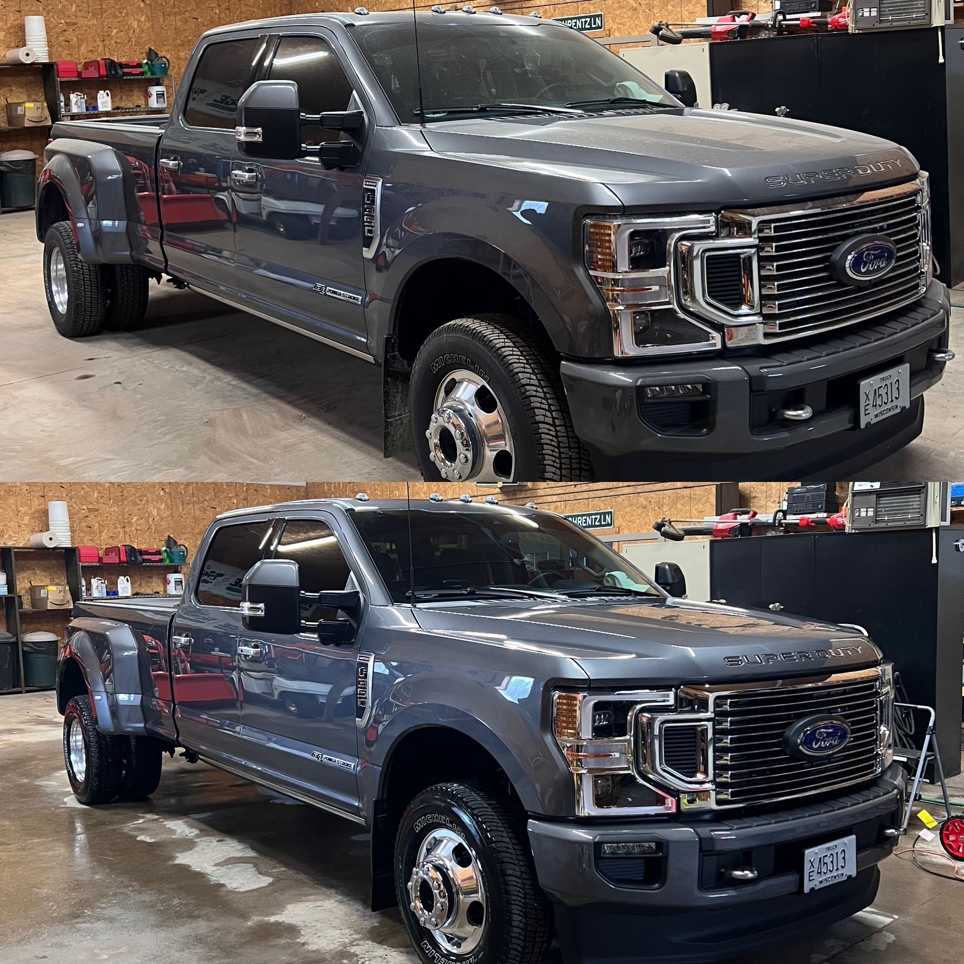 A man is cleaning the wheel of a black car with a sponge.