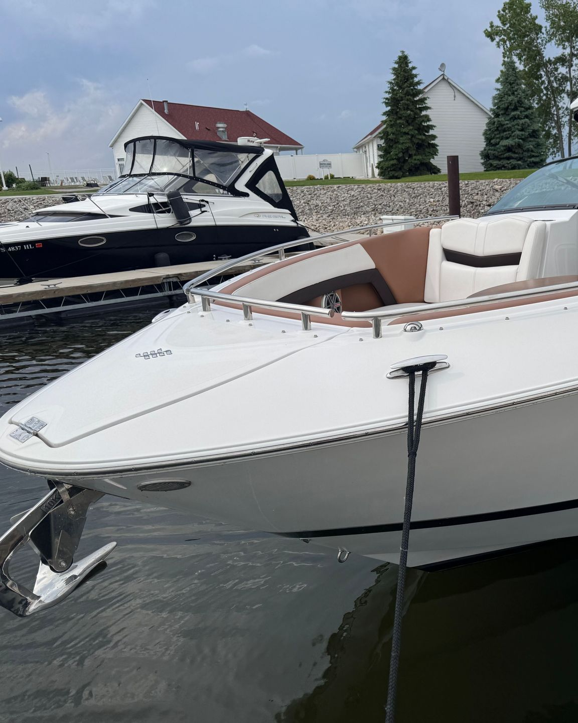 A yellow sports car is parked in a garage.