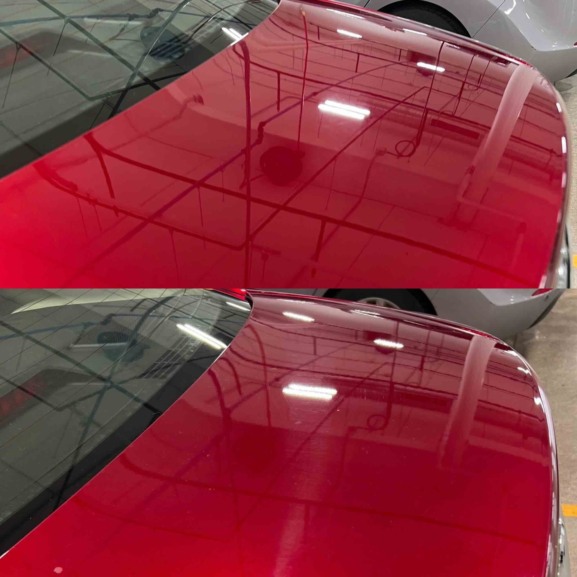 A person is cleaning a blue car with an orange towel