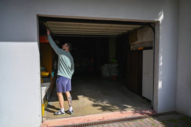 A man working in a garage.