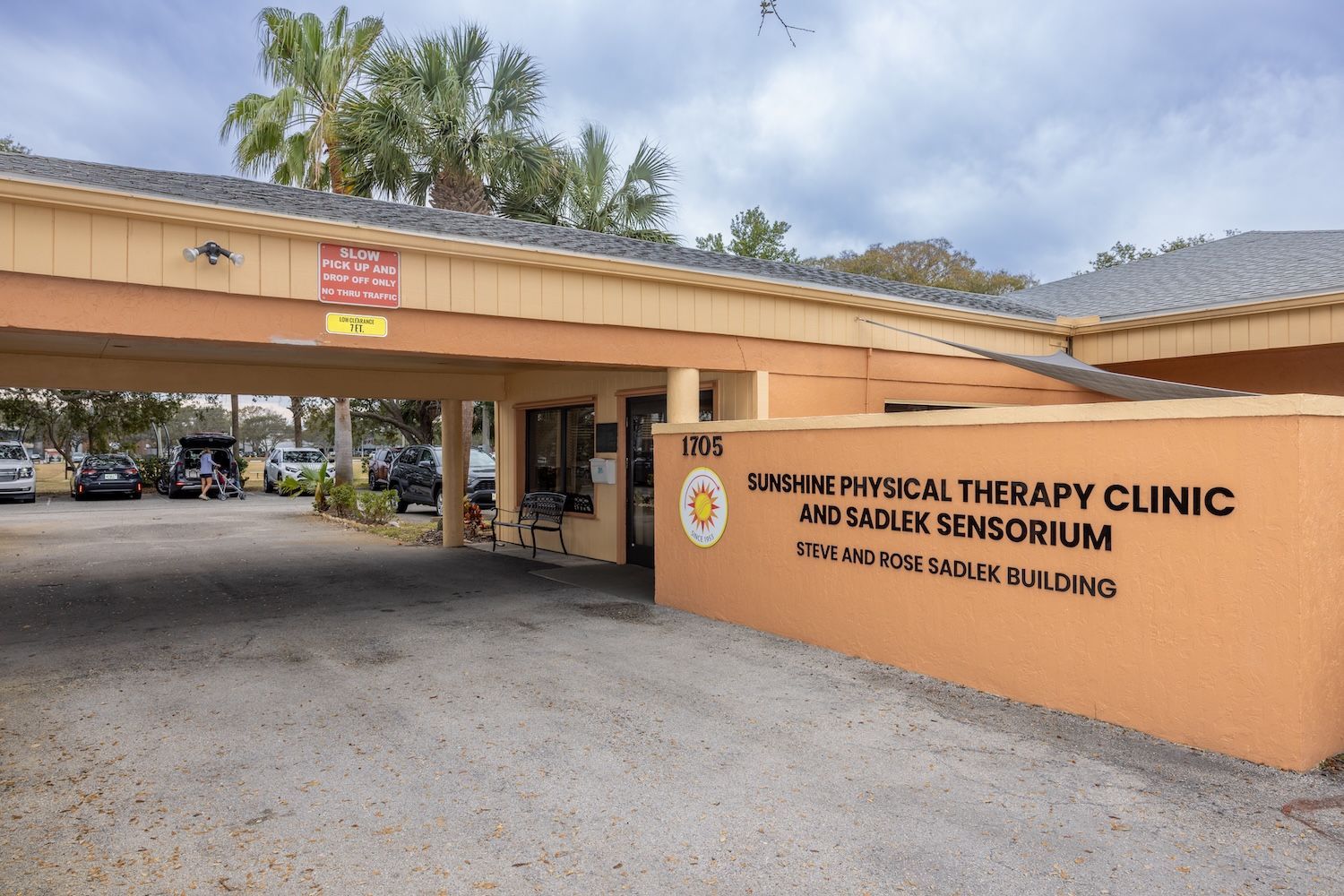 A sign for the sunshine physical therapy clinic