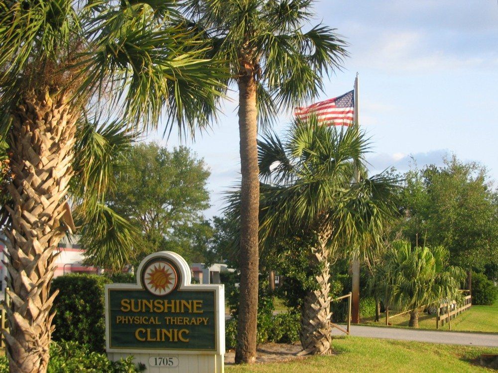 A sign for the sunshine physical therapy clinic