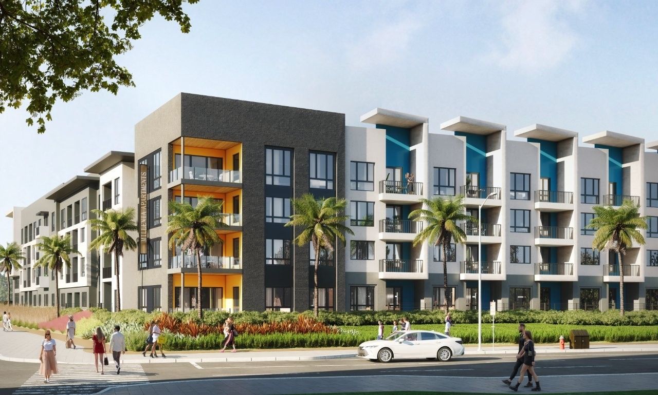 Modern apartment building with people walking on the sidewalk and palm trees.