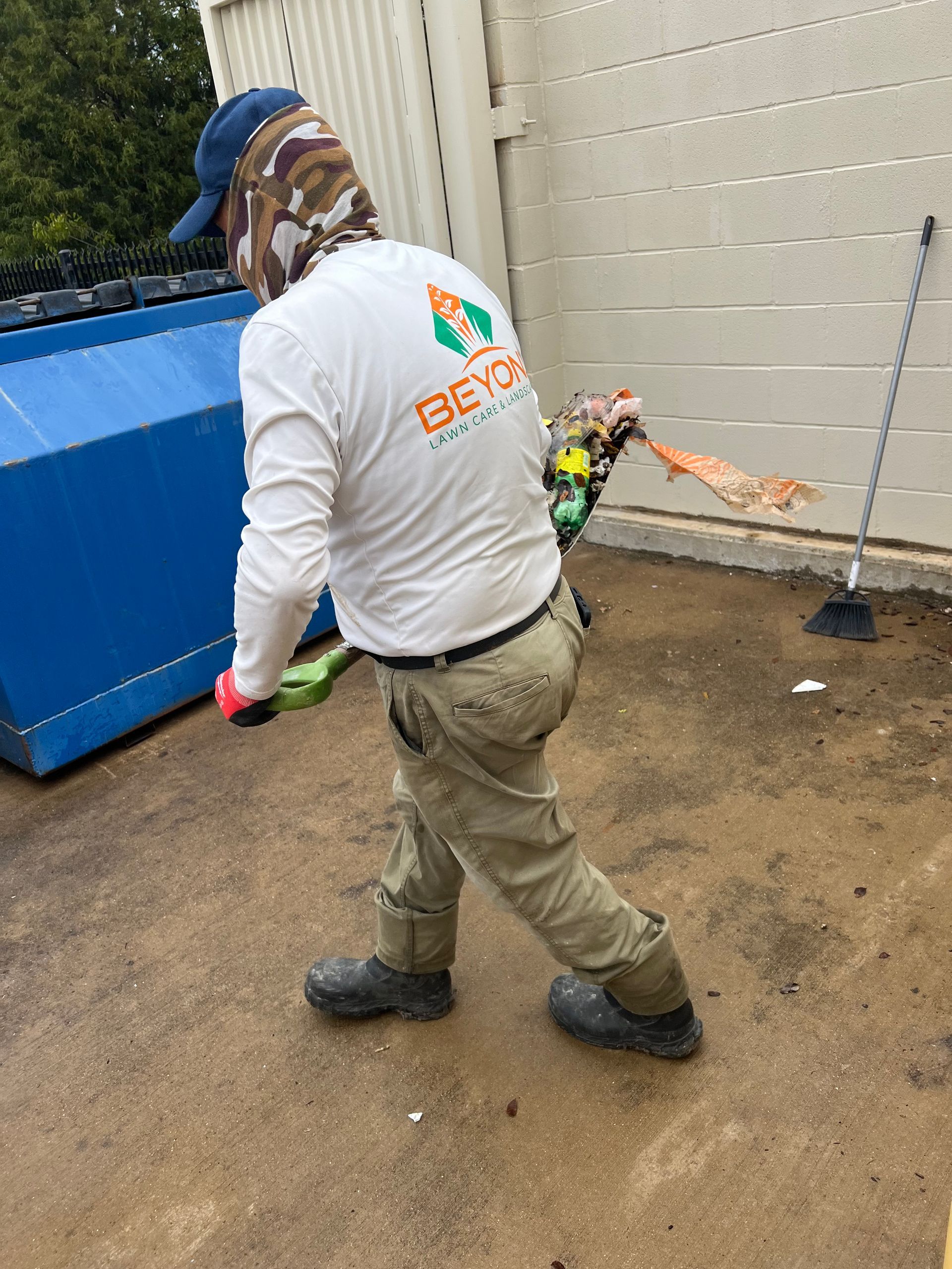 A man wearing a white shirt with the word bench on it