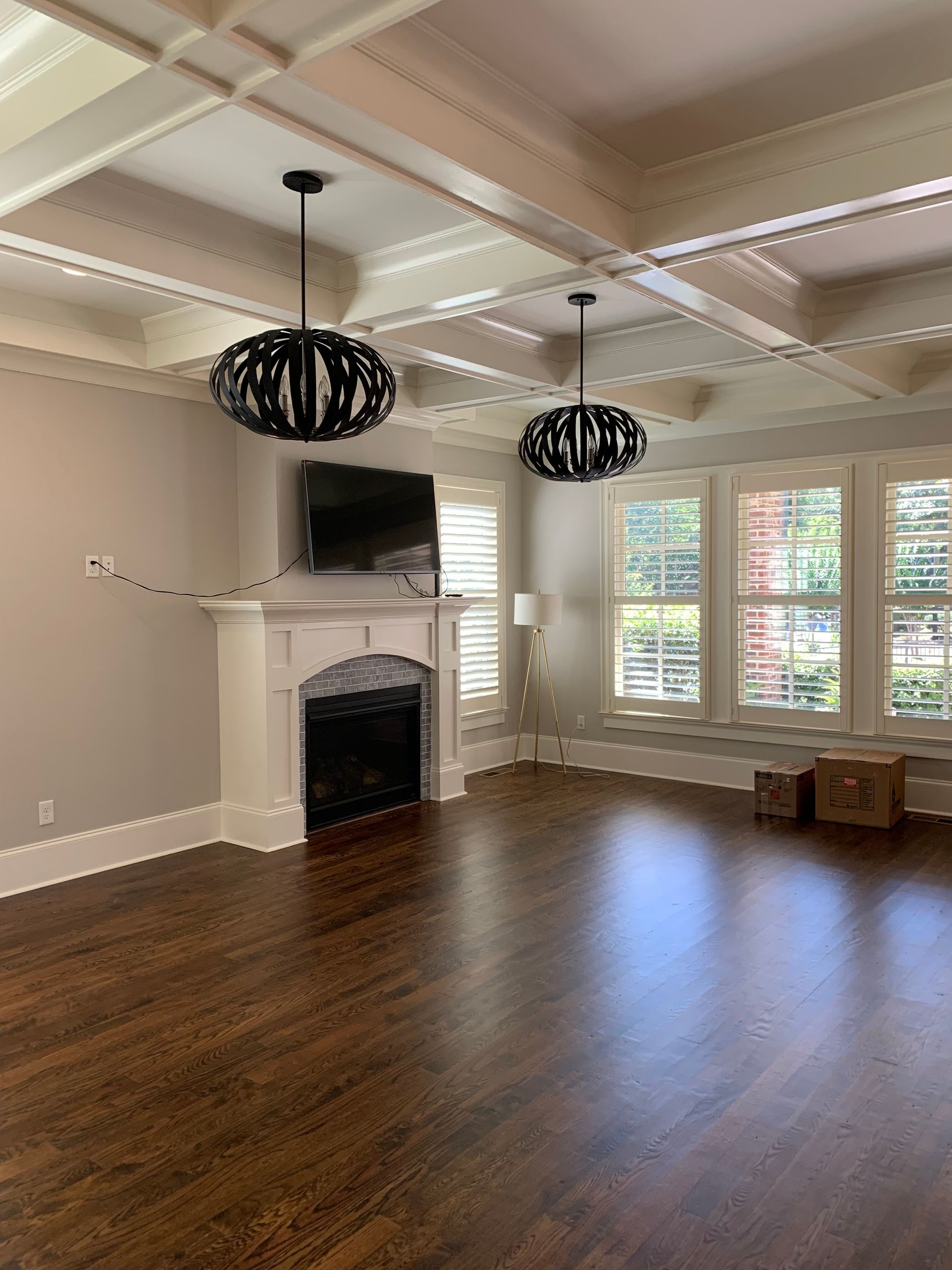 There is a fireplace in the middle of the room.