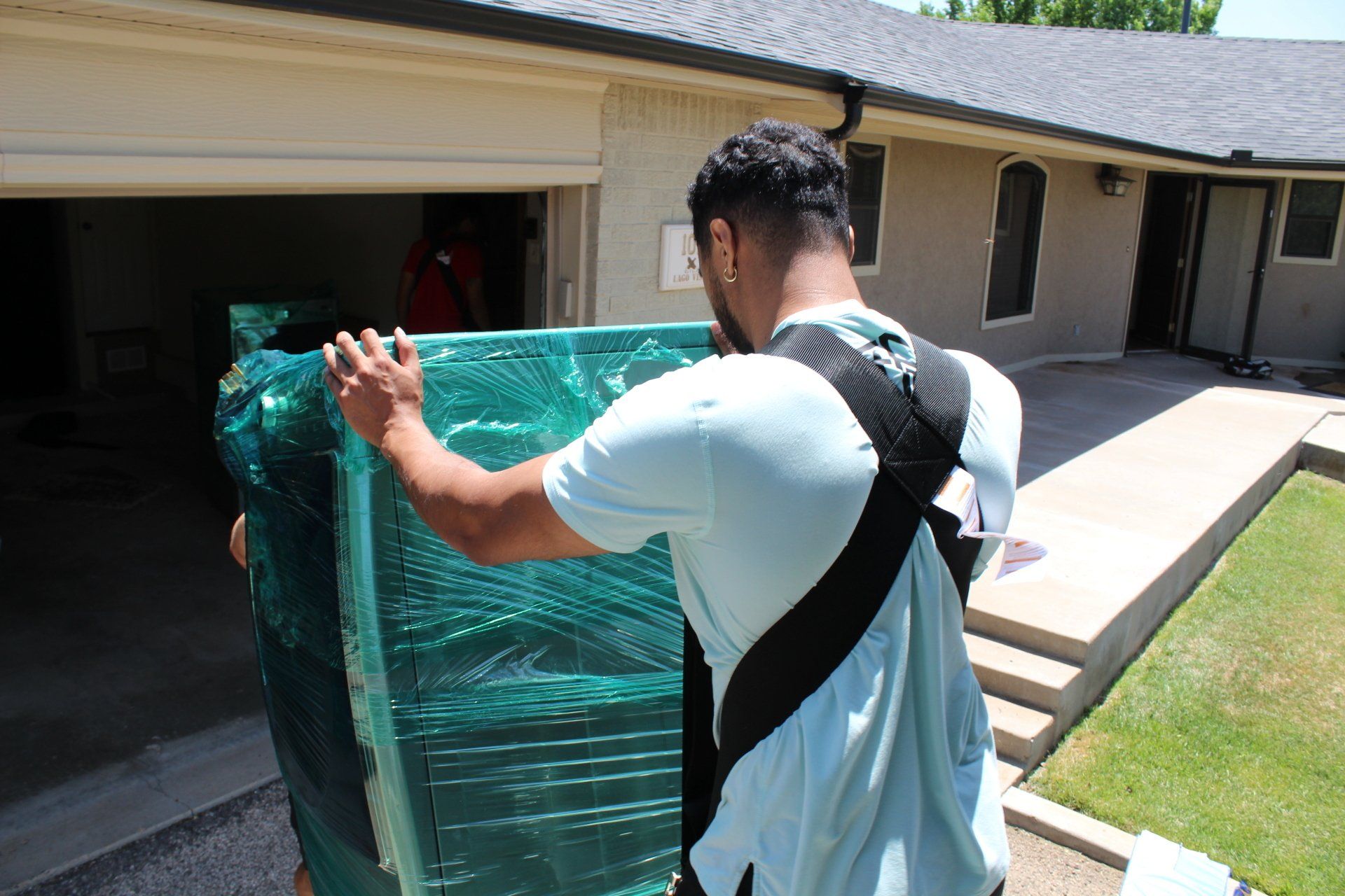 Movers in uniform offering professional service