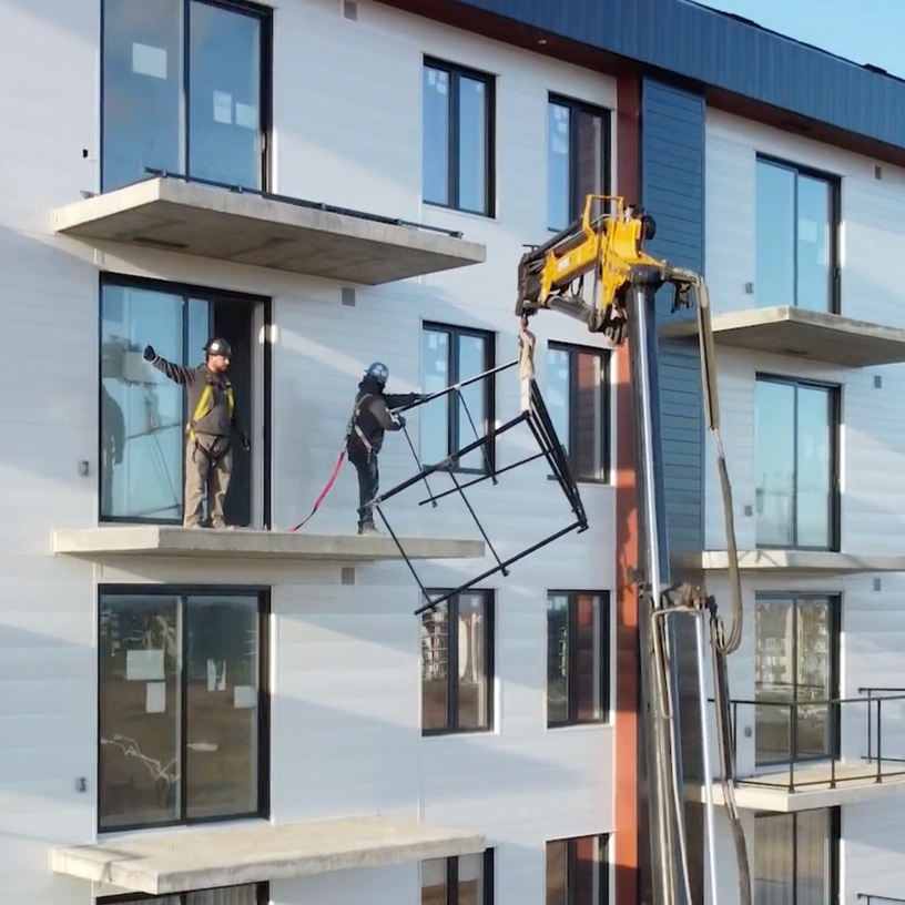 workers installing aluminum railings