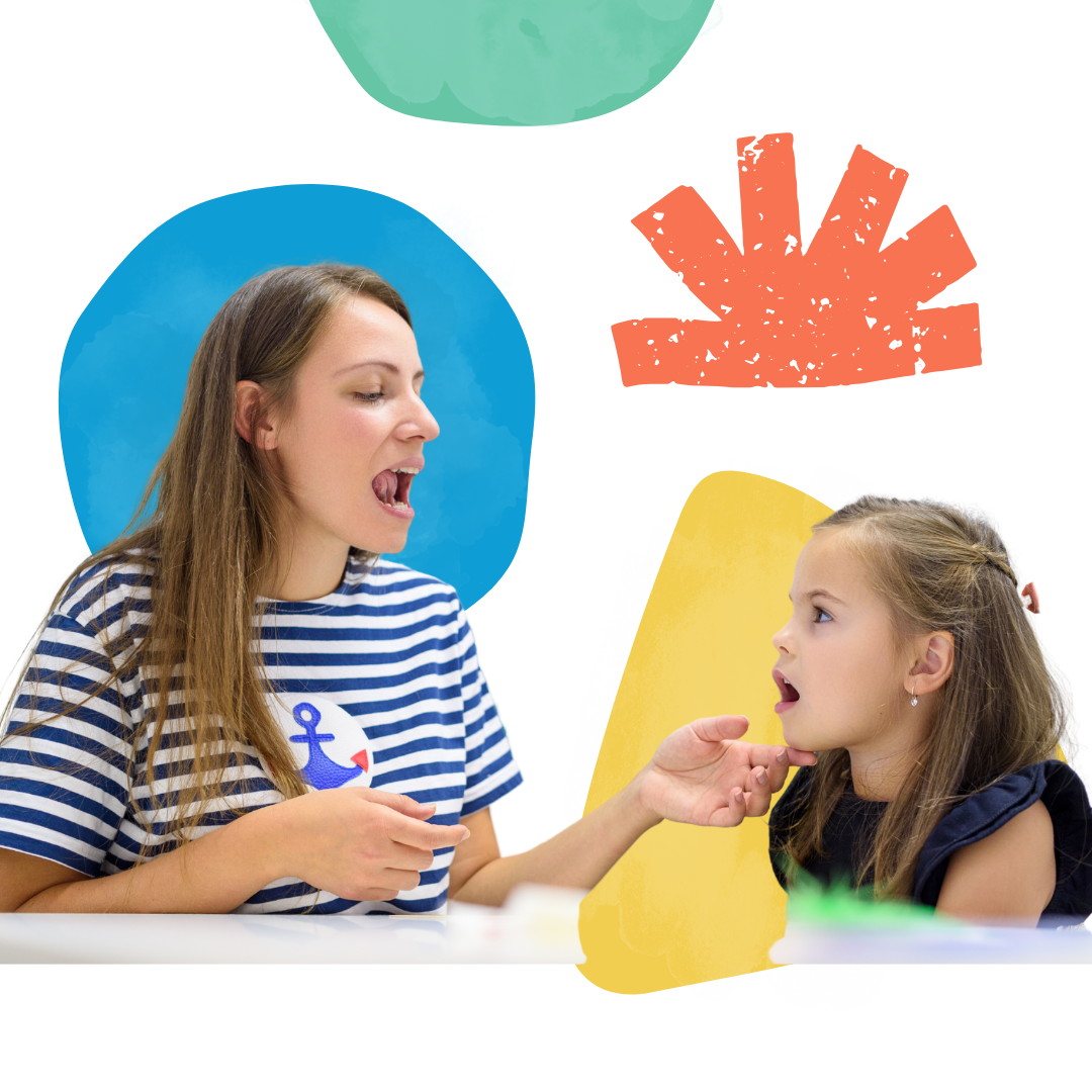 A little girl in a white shirt is looking up at something