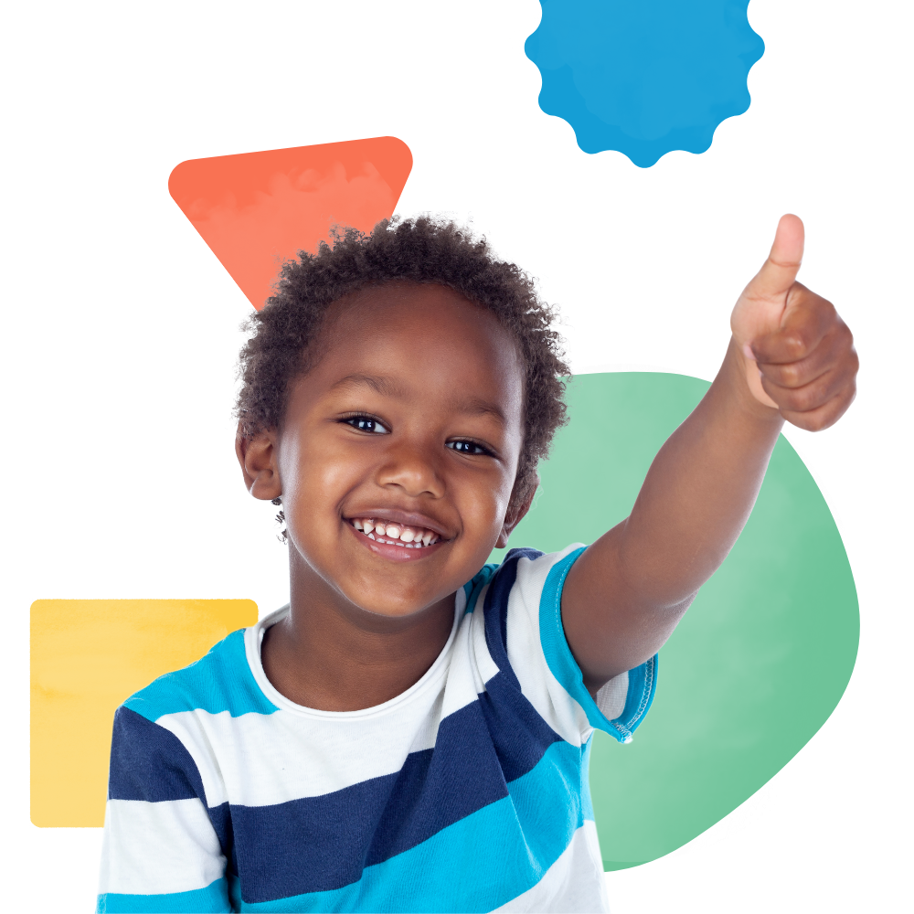 A young boy in a striped shirt is giving a thumbs up