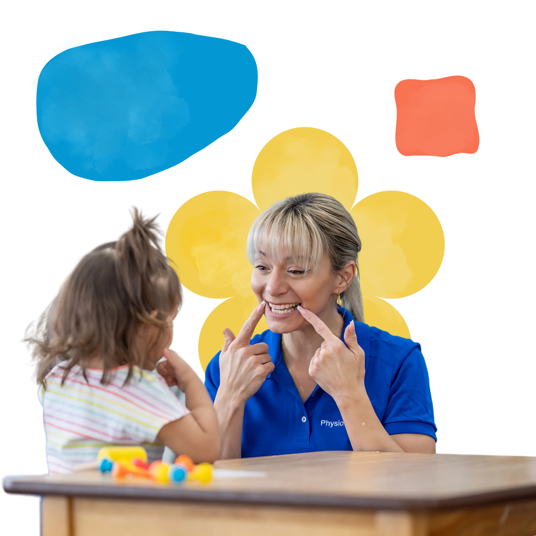 A woman in a blue shirt is talking to a little girl