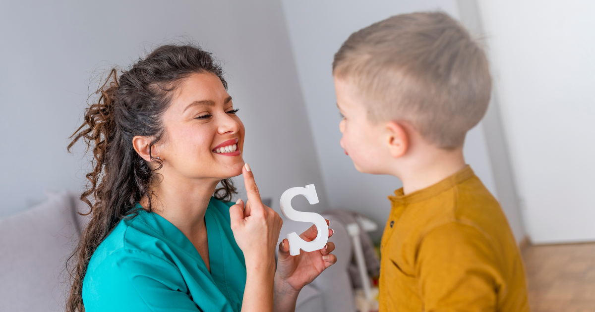 speech therapist training a toddler for speech articulation