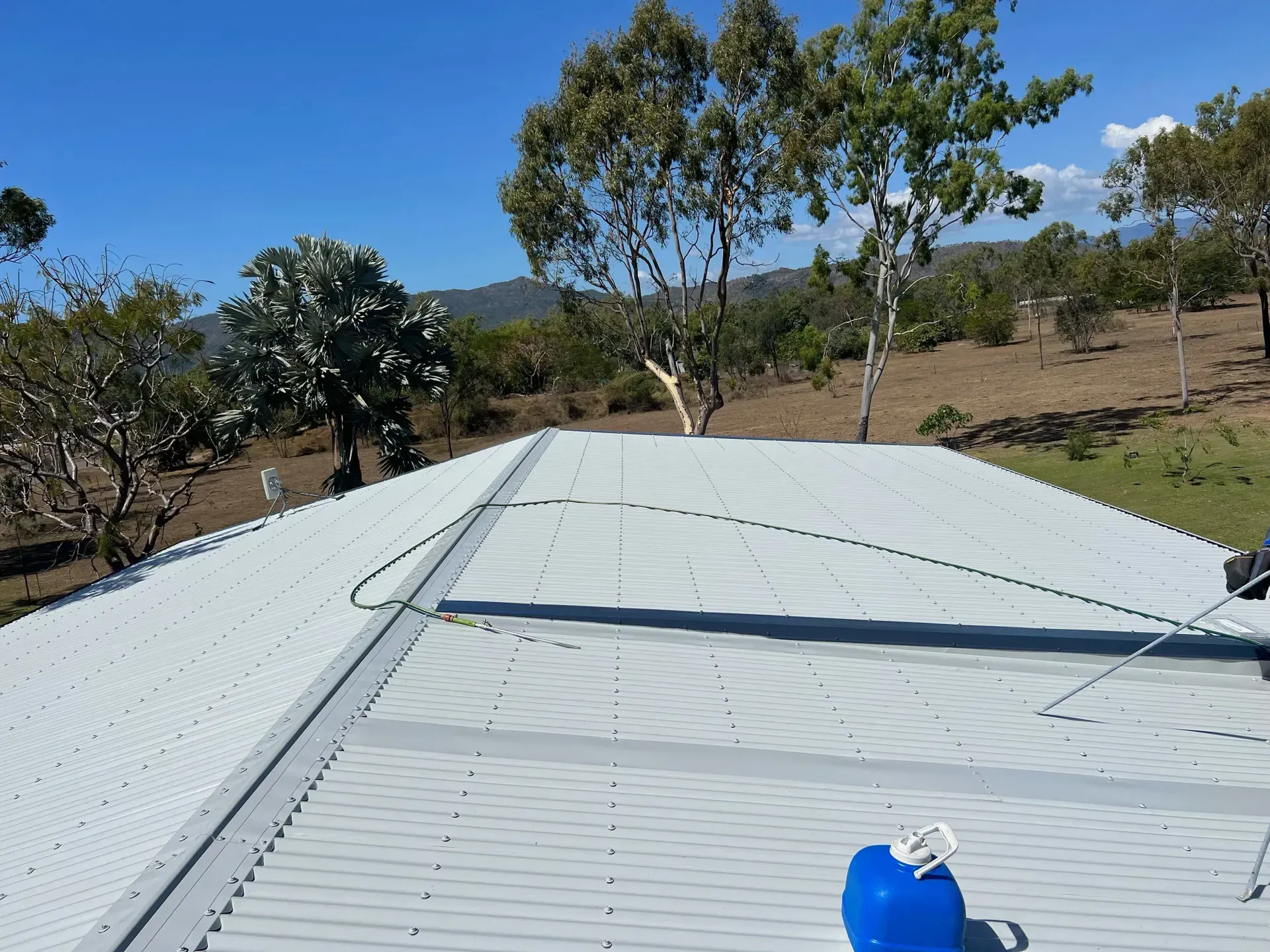 Contemporary Brown Metal Roofing — Roofer in Douglas, QLD