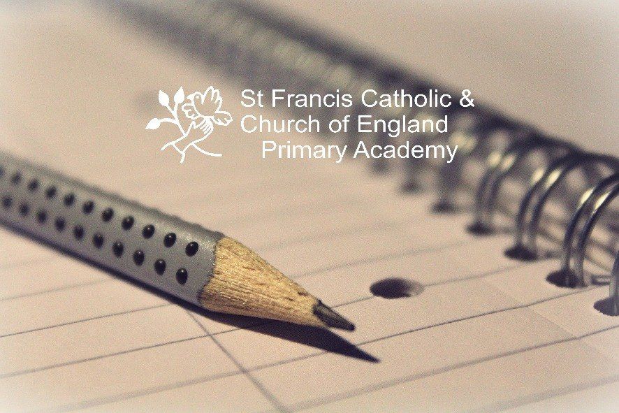 St Francis logo on a notepad and pencil