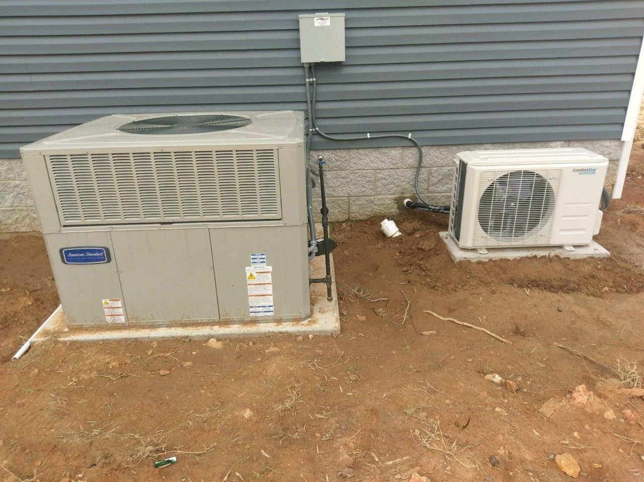 AC and ductless condenser installation from David Brown Heating & Cooling.