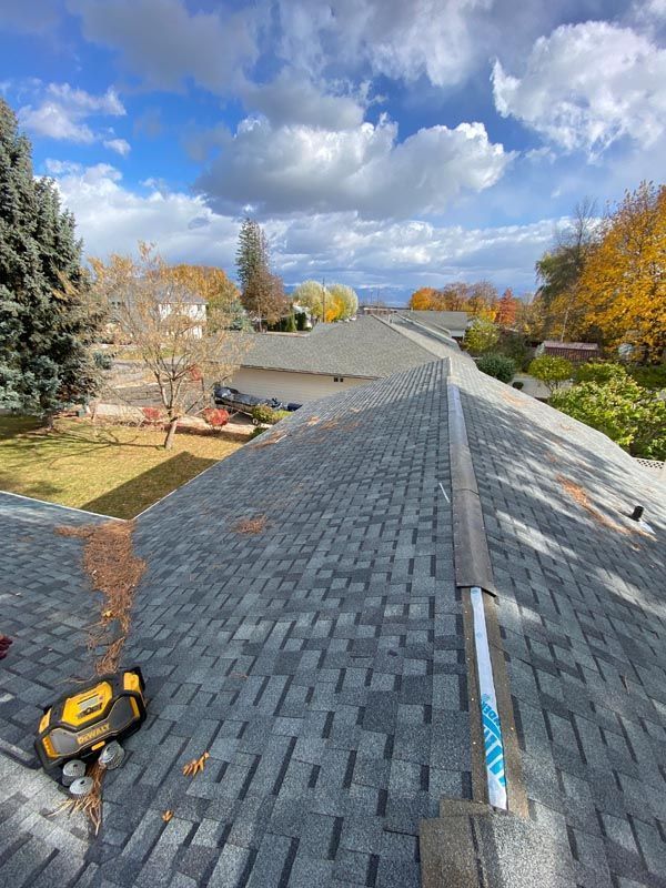 A roof with a measuring tape on top of it.